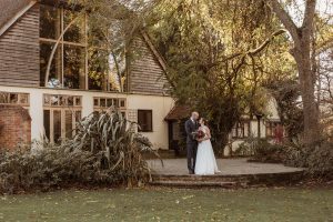 Rivervale Barn Wedding bride and groom in garden
