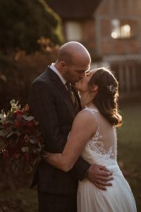 Rivervale Barn Wedding, bride and groom kissing