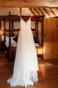 Wedding dress hung up at Cain manor